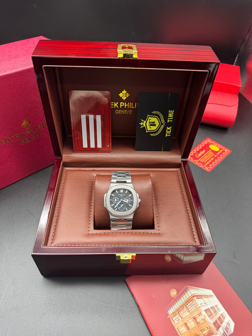 Patek- PHILIPPE STEEL NAUTILUS WITH MOON PHASE AND POWER RESERVE