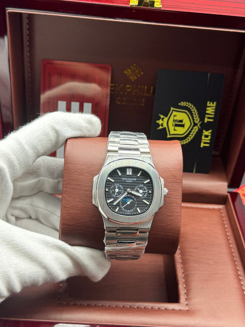 Patek- PHILIPPE STEEL NAUTILUS WITH MOON PHASE AND POWER RESERVE