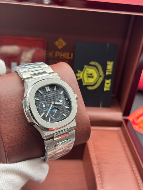 Patek- PHILIPPE STEEL NAUTILUS WITH MOON PHASE AND POWER RESERVE