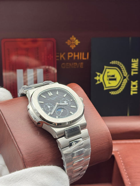 Patek- PHILIPPE STEEL NAUTILUS WITH MOON PHASE AND POWER RESERVE