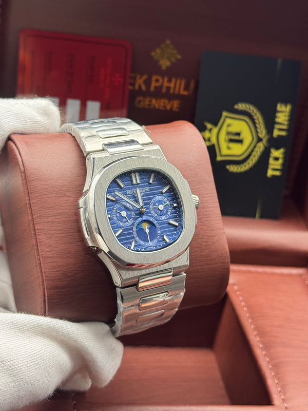 Patek- PHILIPPE STEEL NAUTILUS WITH MOON PHASE )