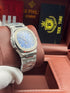 Patek- PHILIPPE STEEL NAUTILUS WITH MOON PHASE )
