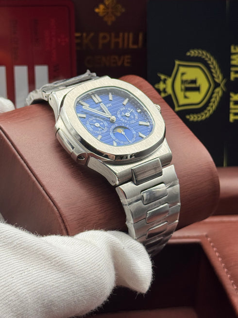 Patek- PHILIPPE STEEL NAUTILUS WITH MOON PHASE )
