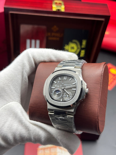 Patek- PHILIPPE STEEL NAUTILUS WITH MOON PHASE one