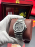 Patek- PHILIPPE STEEL NAUTILUS WITH MOON PHASE one