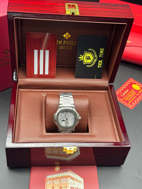 Patek- PHILIPPE STEEL NAUTILUS WITH MOONHASE AND POWER RESERVE for