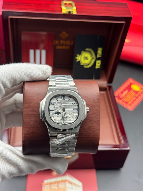 Patek- PHILIPPE STEEL NAUTILUS WITH MOONHASE AND POWER RESERVE for