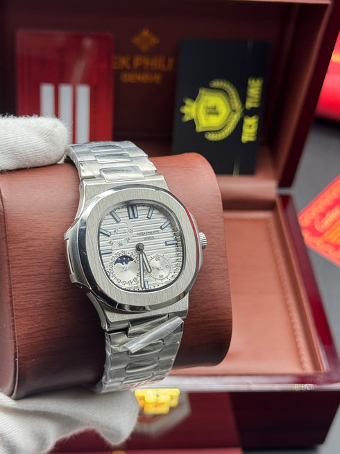 Patek- PHILIPPE STEEL NAUTILUS WITH MOONHASE AND POWER RESERVE for