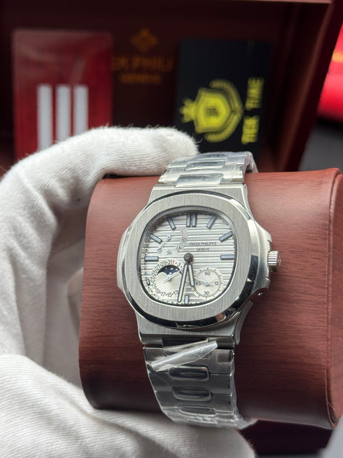 Patek- PHILIPPE STEEL NAUTILUS WITH MOONHASE AND POWER RESERVE for